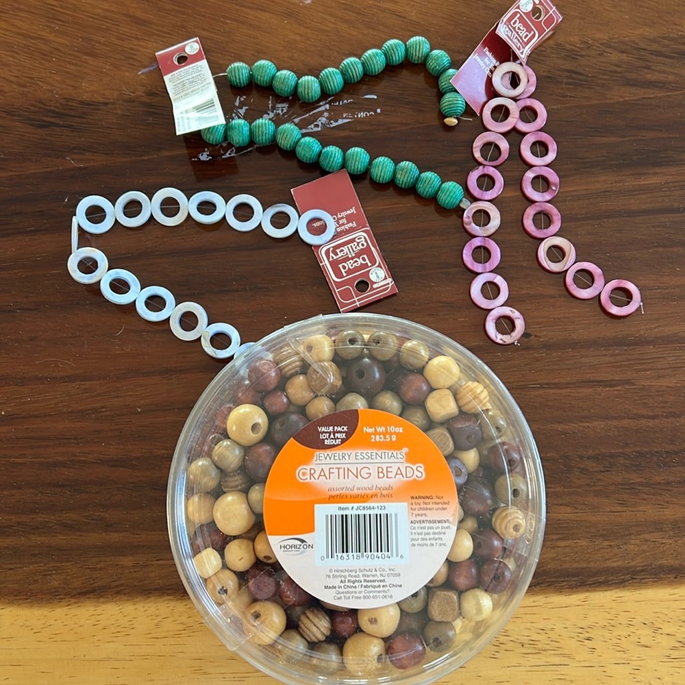Crafting beads lot includes bin of wooden beads, a string of wooden & MoP beads